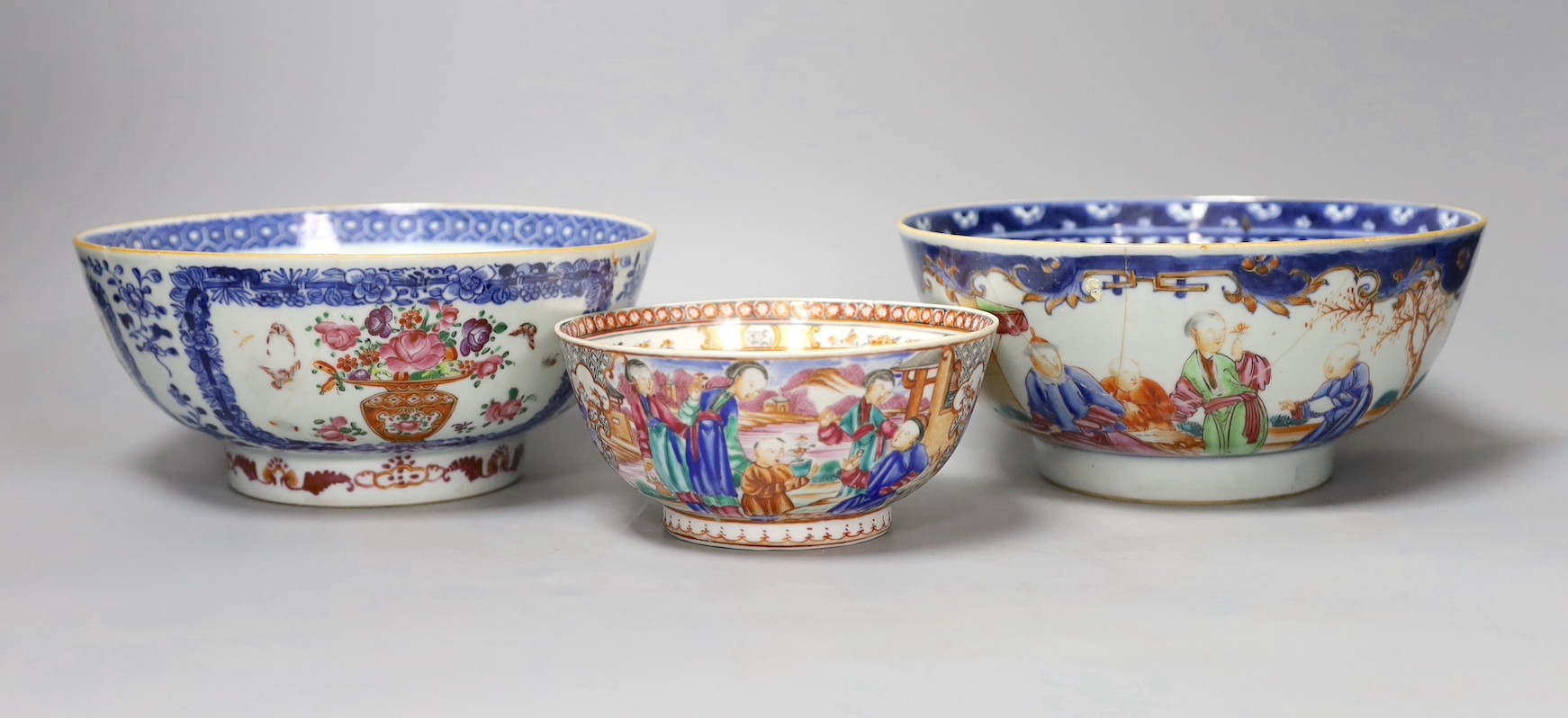 Three 18th century Chinese export famille rose bowls (two a/f), largest bowl 19.5 cms diameter